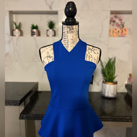 NWT - Express - Women’s size small, zip back, fitted peplum style - Picture 3 of 4